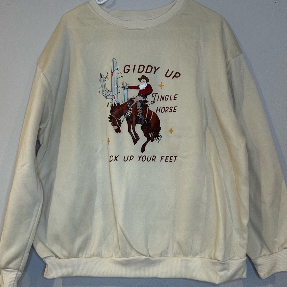 NWT, "giddyup jingle horse", cowboy Christmas sweatshirt and a size 2XL.